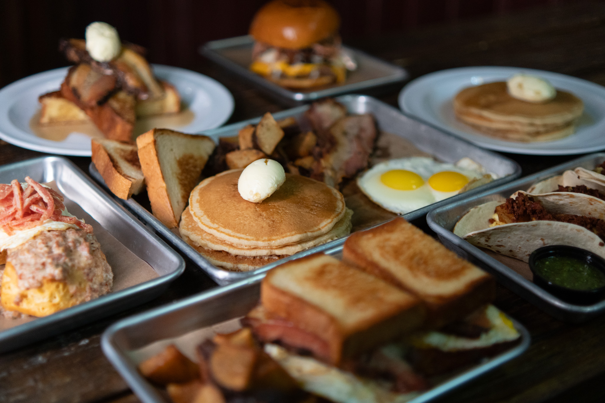 RCP weekend breakfast spread with pancakes, eggs, toast, tacos, and sandwiches